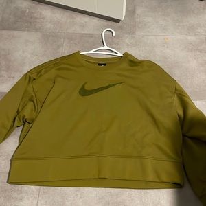 this is a green nike sweatshirt in a size medium. genuinely never been worn
